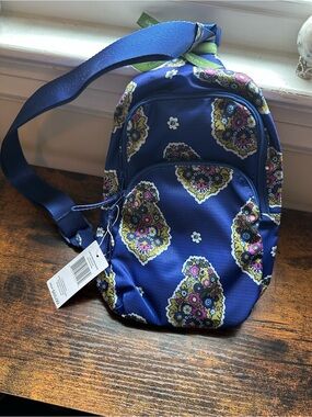 Vera Bradley Blue Floral Sling Backpack with Yellow and Pink Accents